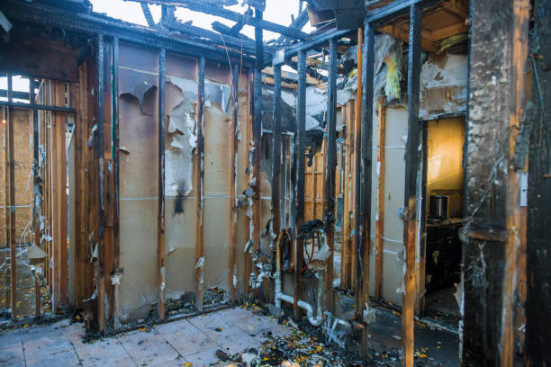 Professional Fire Damage Restoration technician working in Amery, WI